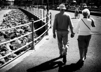 Elderly-couple-walking-near-beach-edited